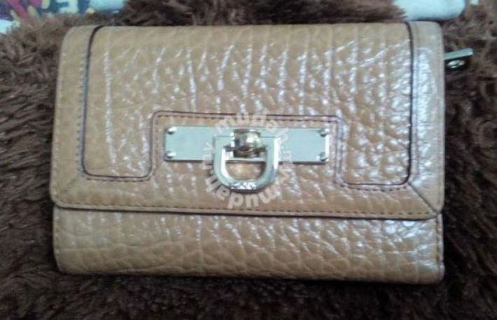 Cum sa cumperi o geanta originala fara sa iei teapa?